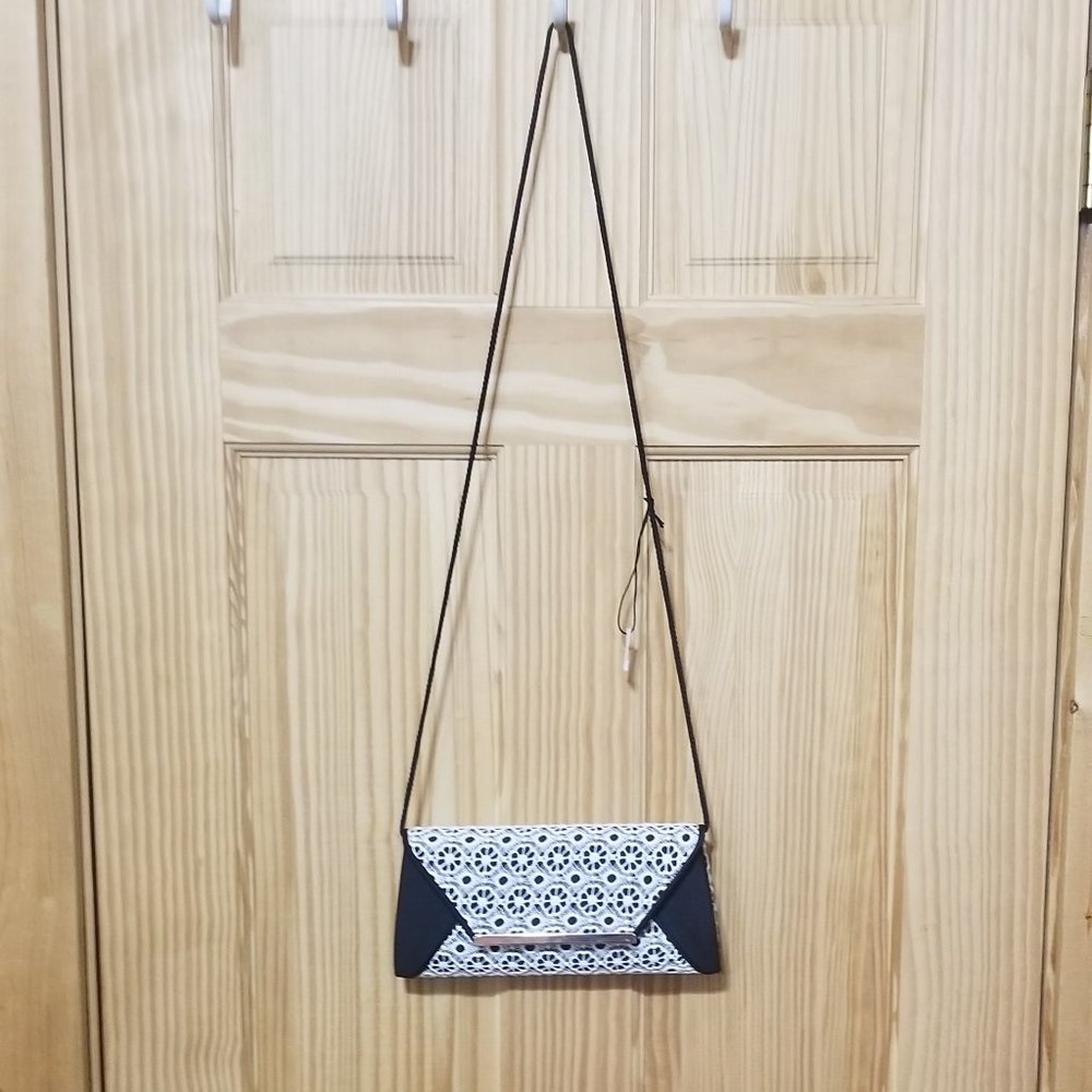 Kate Landry Black and White Embroidered clutch